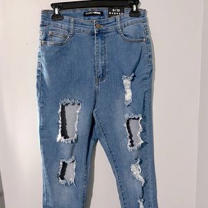 Ripped/worn stretchy jeans